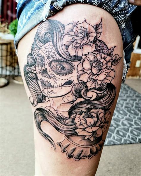 Colur sugar skull and roses tattoo partly done by