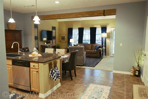 Revamp Your Home with Exquisite Cased Openings - A Perfect Blend of Elegance and Functionality Between Kitchen and Living Room