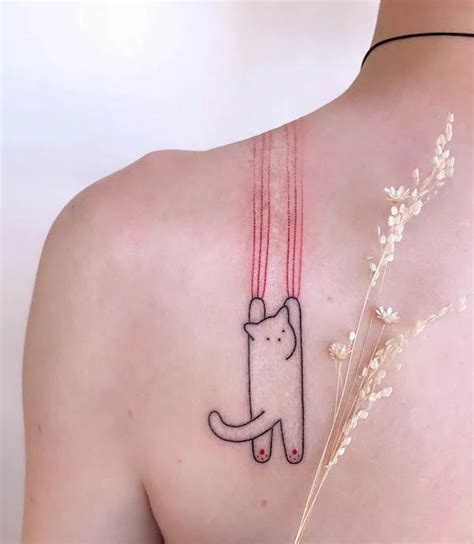 Cat Scratching Tattoo