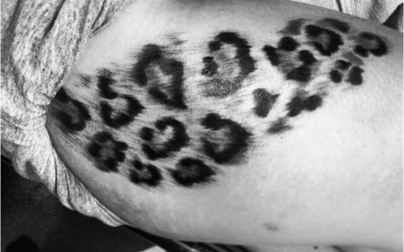 Cheetah Print Tattoo On Thigh