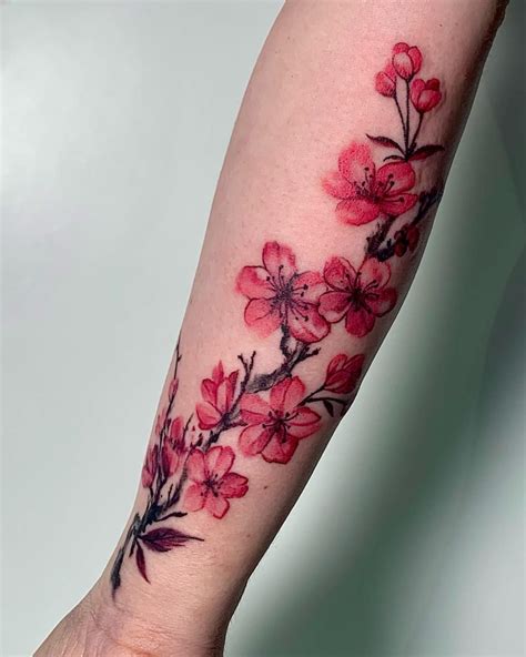 attractive realistic cherry blossom tattoo for women on