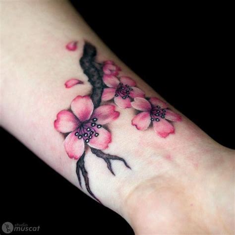 Cherry blossom wrist tattoo Cherry blossom tattoo