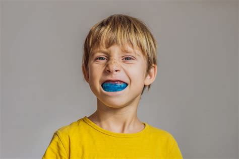 Child wearing a mouthguard