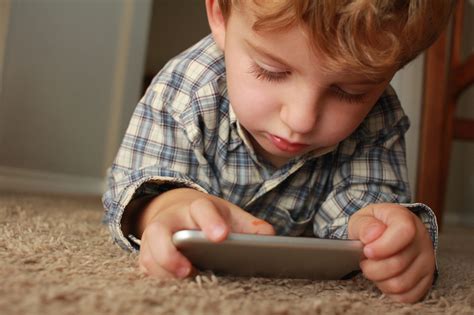 Child playing games on phone