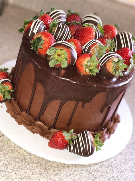 Chocolate Cake With Chocolate Covered Strawberries On Top