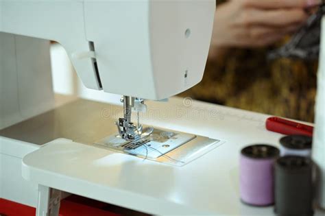 Close up of a sewing machine and thread