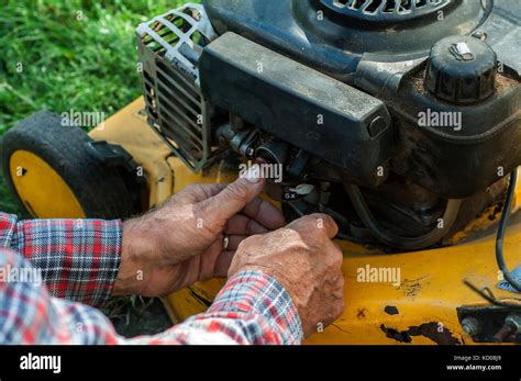Close up of lawn mower engine damage