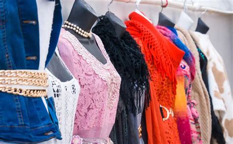 Clothes on rack in consignment shop