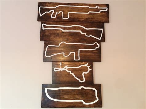 Unleash Your Inner Zombie Slayer: Elevate Your Home Décor with COD Zombies Wall Gun Decoration