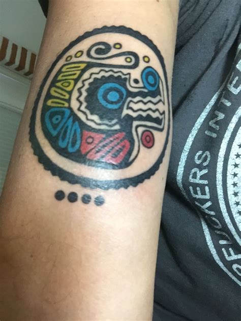 Columbian impressed tattoo by Michael Fatutoa in 2020