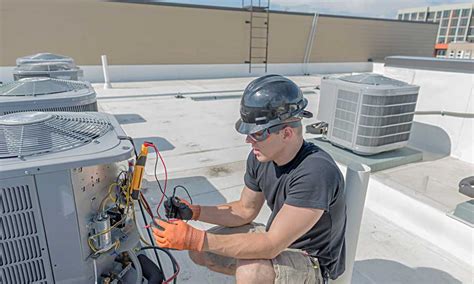 Commercial HVAC system with technician