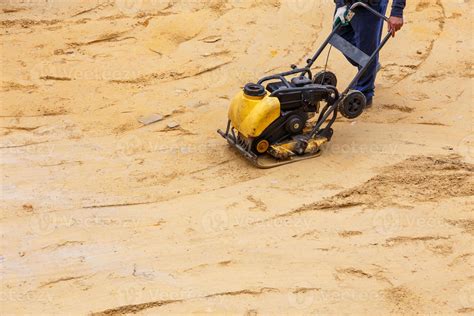 Compacting Sand in an Arena