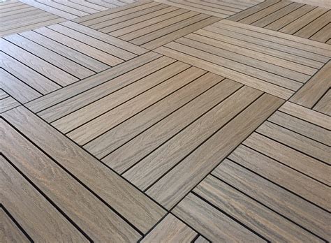 Composite deck tile with wood grain