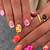 Confidently Bold: Get Playfully Trashy with Y2K Nail Art