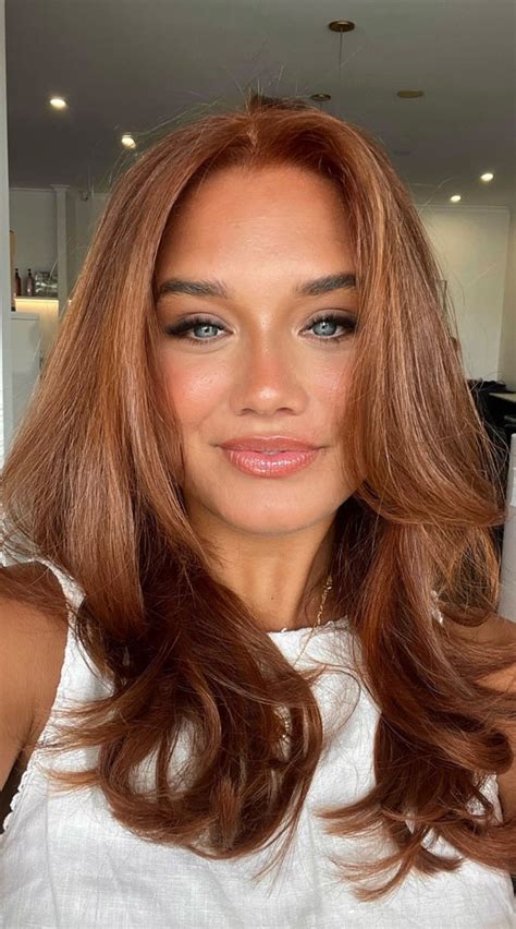 Copper Canoodle: Elevating the Beauty of Olive Skin with Luscious Copper Hair.