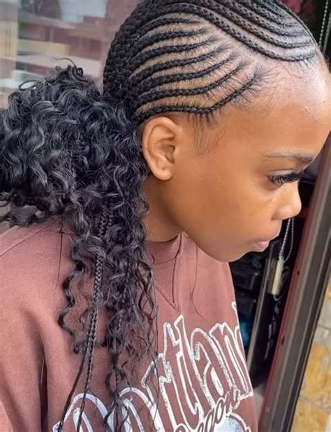 Cornrows with Extensions or Added Curls