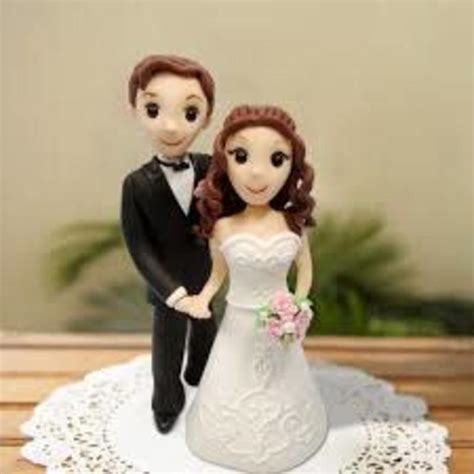 Cost effective nuptial cake toppers