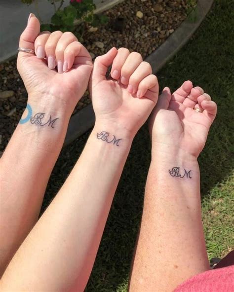 Couple Initial Tattoos