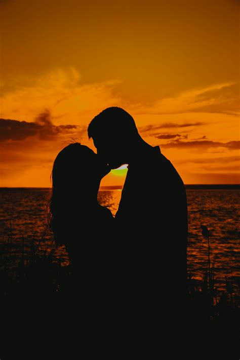 Couple Kissing Sunset