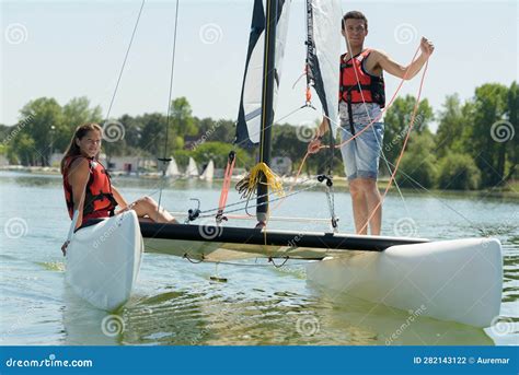 Couple On Catamaran