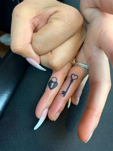 Couple Tattoo In Finger