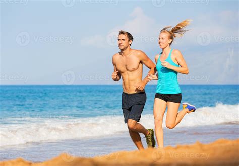 Couple running on a beach