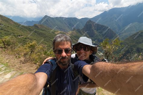 Couple taking selfie at Machu Picchu
