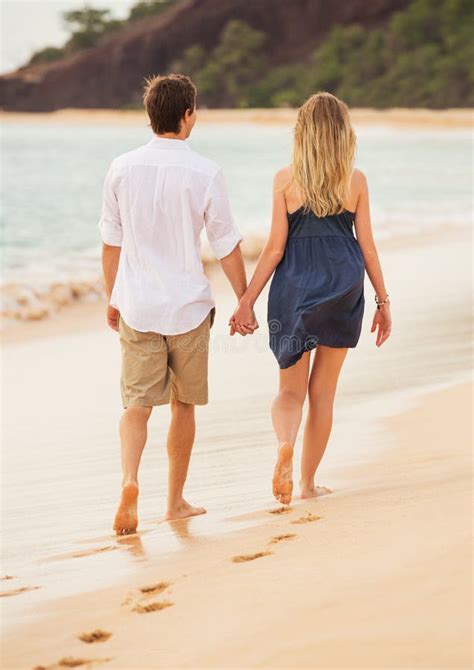 Couple walking on a beach