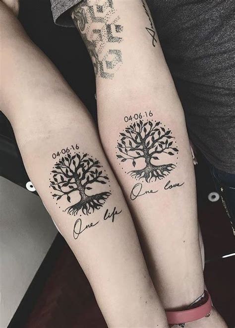 Matching palm tree tattoos for a couple by Kelli Kikcio