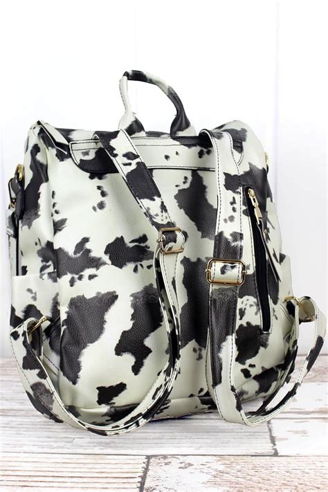 Step Up Your Style with a Cow Print Backpack Purse