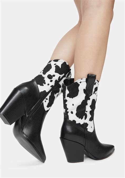 Stylish Cow Print Boots for Women: Trendy Footwear Must-Haves!