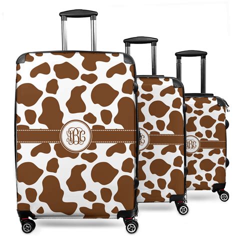 Travel in Style with our Chic Cow Print Luggage!