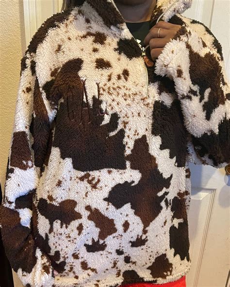 Trend Alert: Elevate Your Wardrobe With a Cow Print Pullover