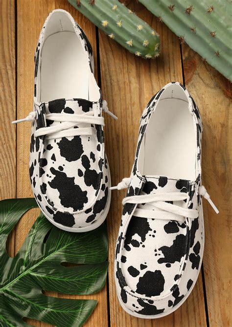 Step into Style with Women's Cow Print Shoes