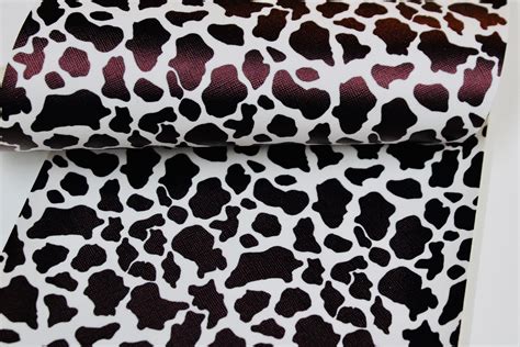 Stylish and Bold: Cow Print Faux Leather for Fashion Enthusiasts