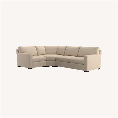Cuddling up in Comfort: Experience unwavering contentment with Crate and Barrel's luxurious Axis Couch!