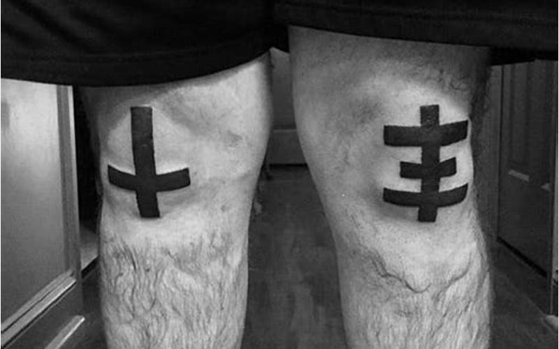 Cross Tattoo Above Knee