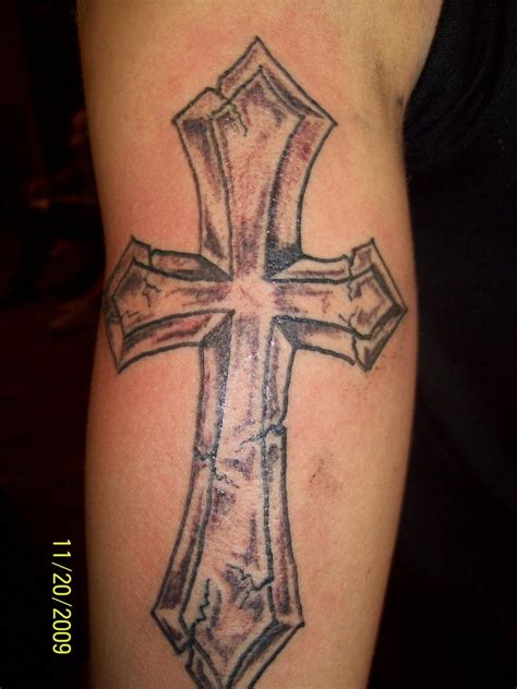 Awesome cross tattoo on the back of my calf by Nate Click