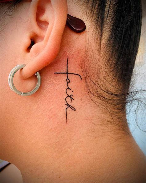 Cross Behind The Ear Tattoo
