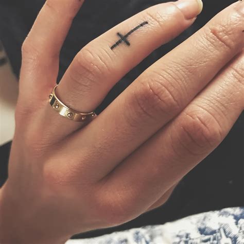 Cross finger tattoo Cross finger tattoos, Finger tattoo