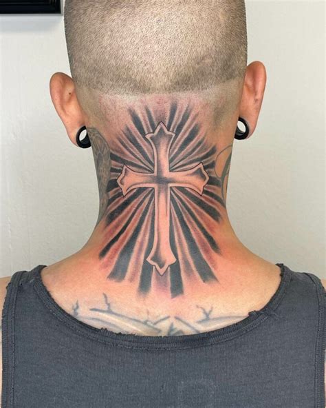 Cross Tattoo On Back Of Neck