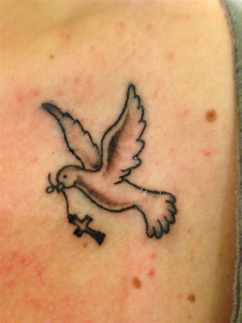 Cross With A Dove Tattoo