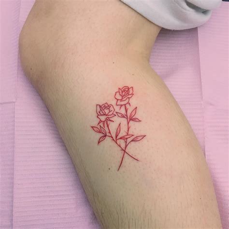 Crossed Roses Tattoo