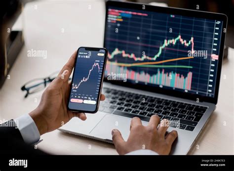 Cryptocurrency Trader Using Laptop