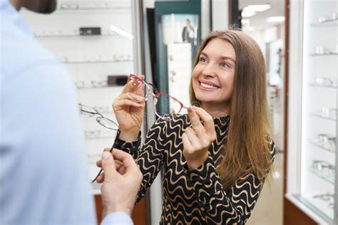 Customer Smiling After Glasses Repair