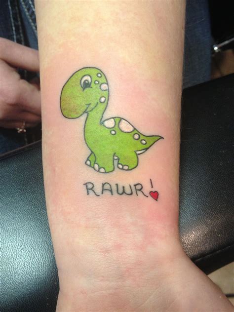 Cute dinosaur tattoo. done by Nick Read. tattoo dinosaur