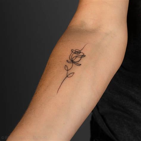 Dainty Rose Tattoo