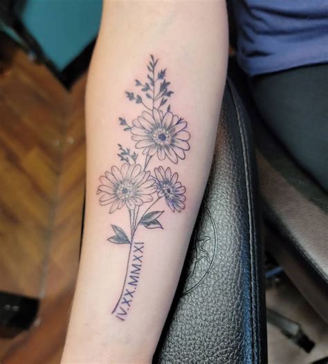 Dazzling Daisy: A Vibrant April Birth Flower Tattoo Design