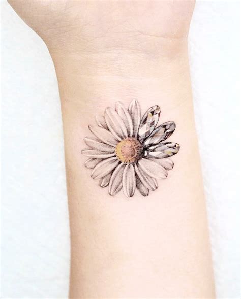 Daisy Forearm Tattoo