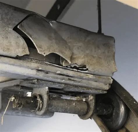 Damaged Garage Door Roller Examples